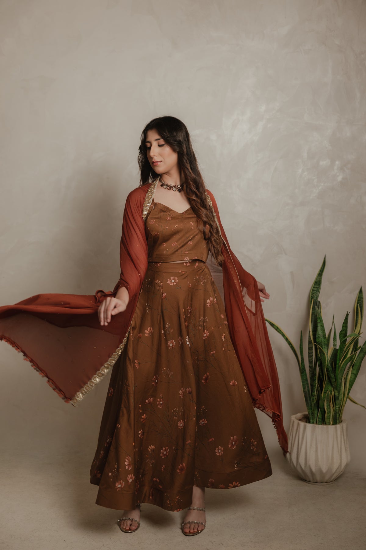 Sthira Zinnia co-ord set, holding the dupatta