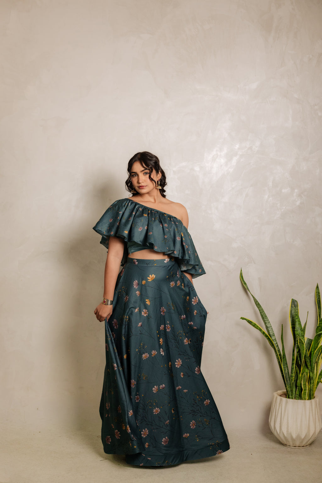 Sthira Iris skirt in vegan silk with botanical print, worn with the teal ruffle blouse
