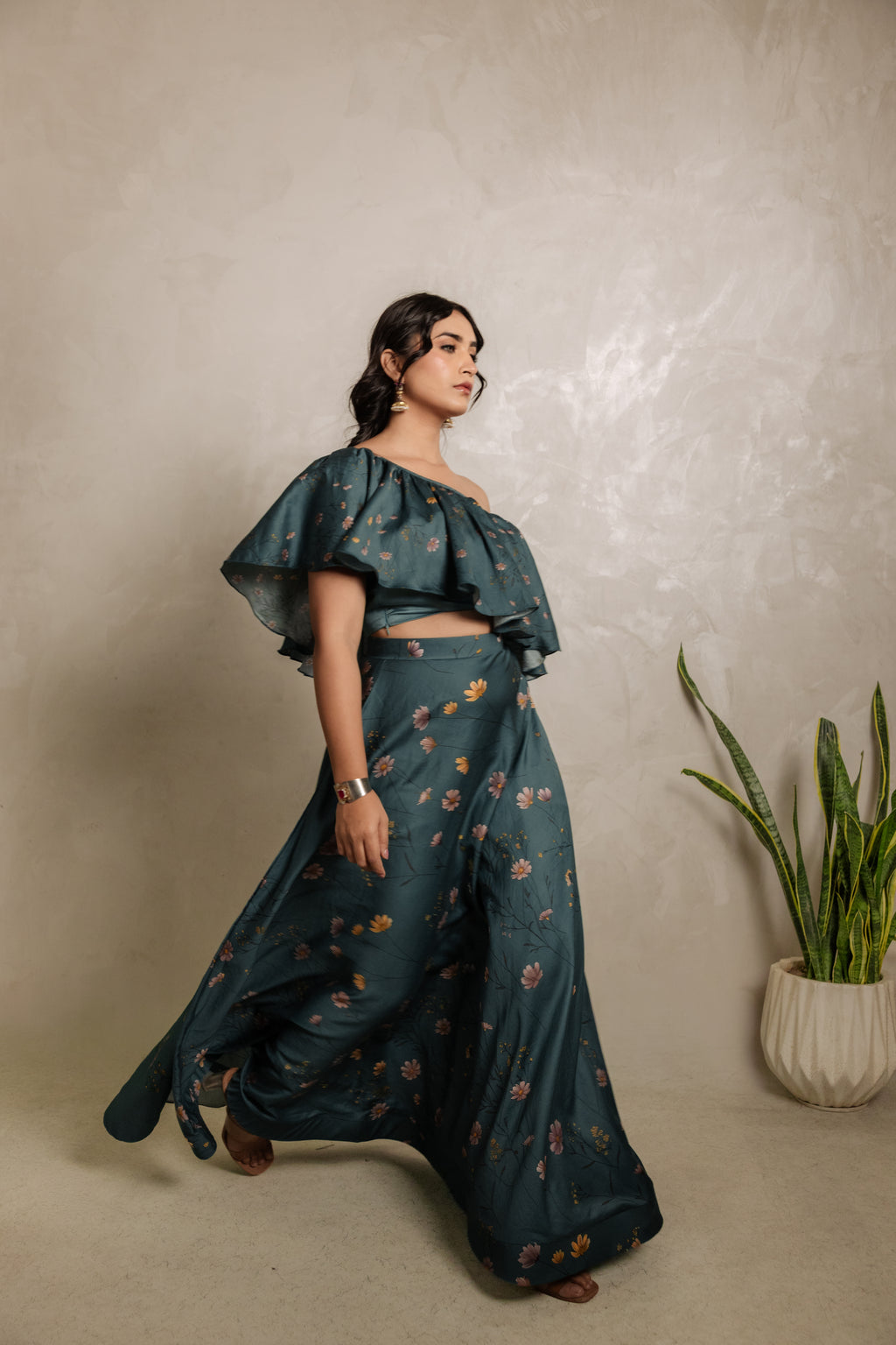 Sthira Iris skirt in vegan silk with botanical print, worn with the teal ruffle blouse