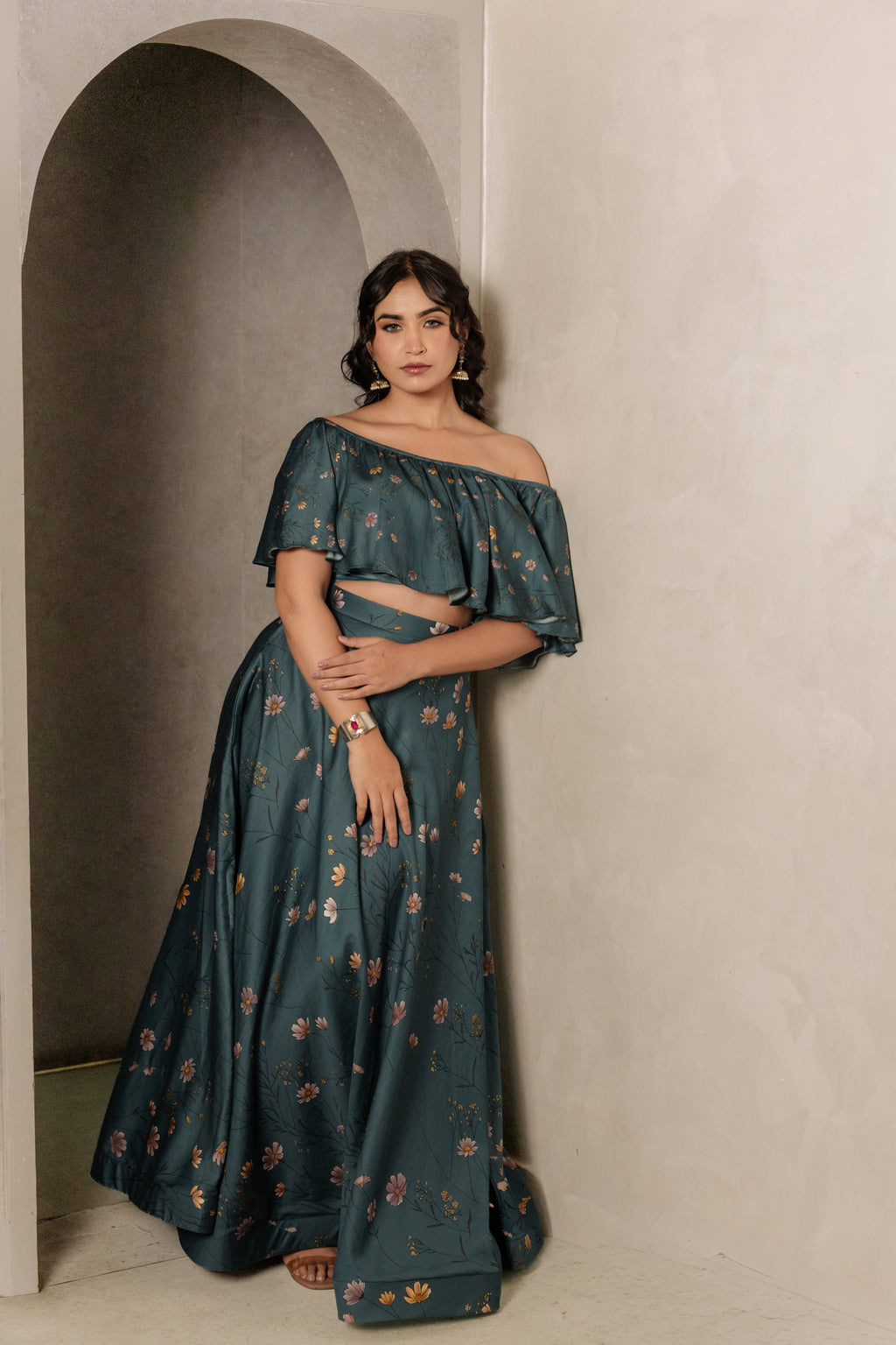 Sthira Iris skirt in vegan silk with botanical print, worn with the teal ruffle blouse
