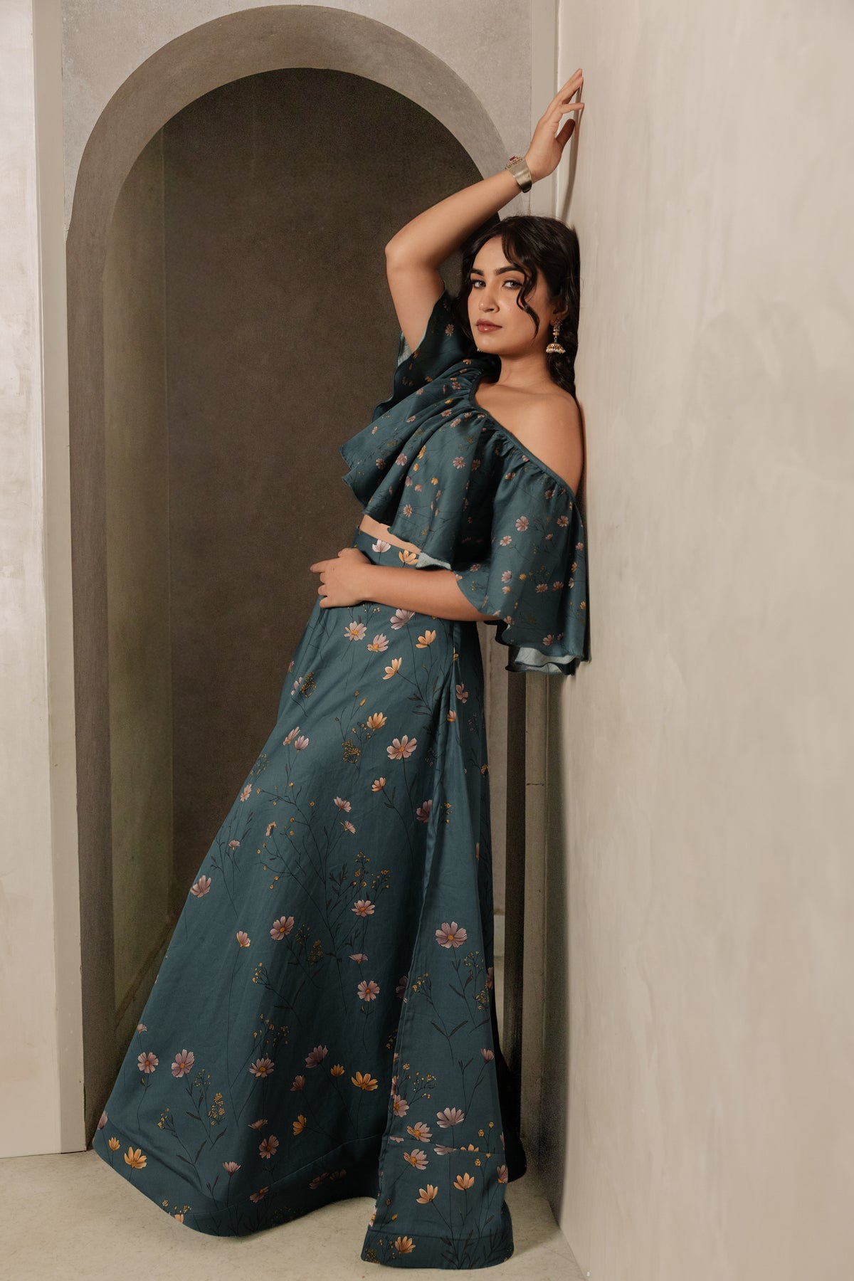 Sthira Iris skirt in vegan silk with botanical print, worn with the teal ruffle blouse