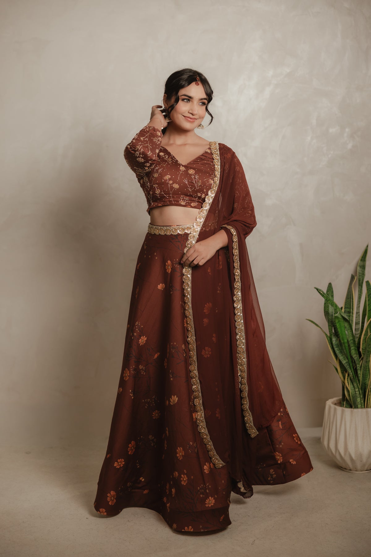 Sthira Marigold lehenga skirt in vegan silk with botanical print, worn with the embroidered blouse