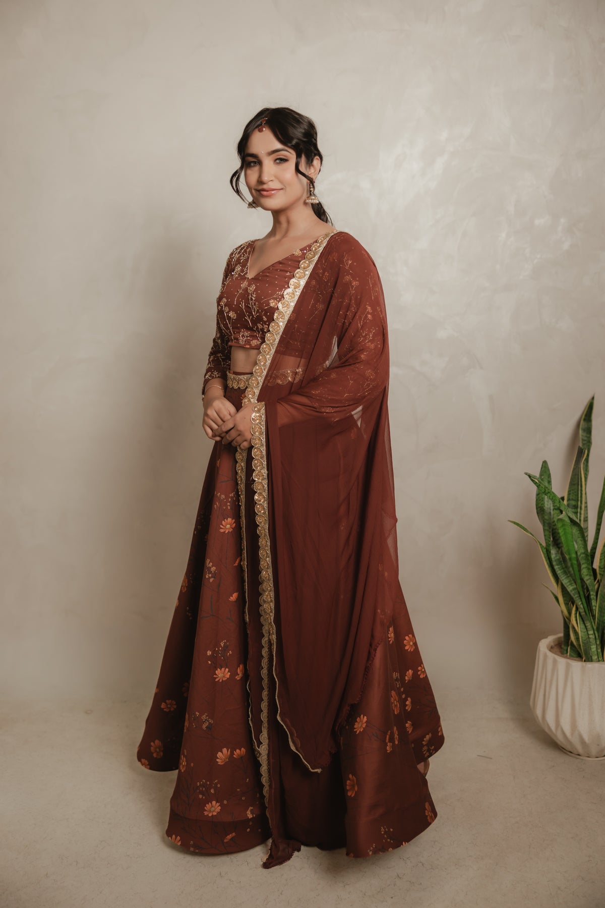 Sthira Marigold lehenga skirt in vegan silk with botanical print, worn with the embroidered blouse