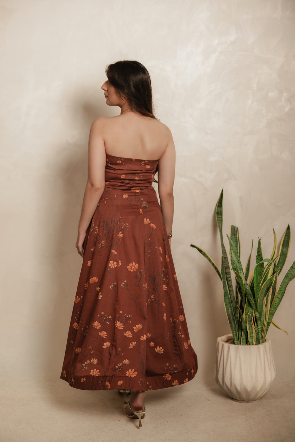 Sthira Calendula co-ord set in vegan silk, rust-brown botanical print, back view
