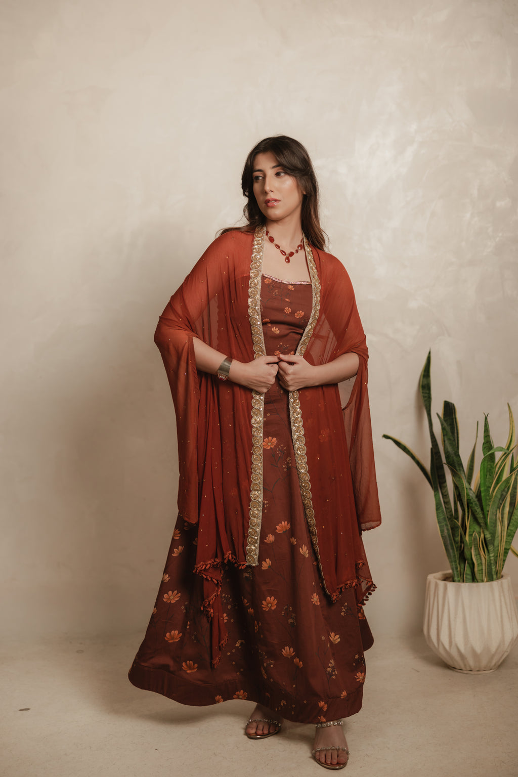 Sthira Calendula gown in vegan silk, rust-brown botanical print, full length front, cape dupatta over shoulders