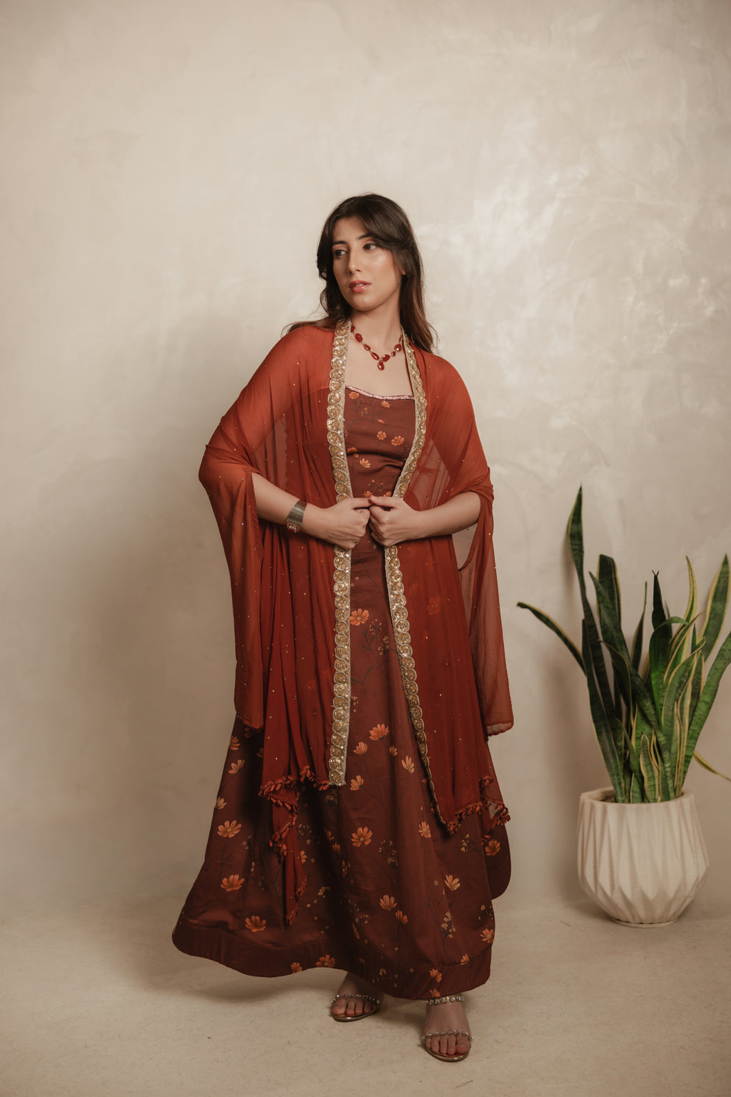 Sthira Calendula gown in vegan silk, rust-brown botanical print, full length front, cape dupatta draped