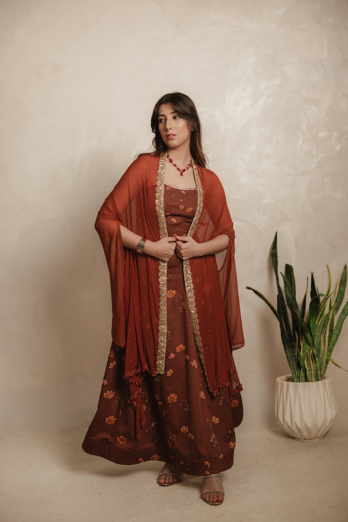 Sthira Calendula gown in vegan silk, rust-brown botanical print, full length front, cape dupatta draped