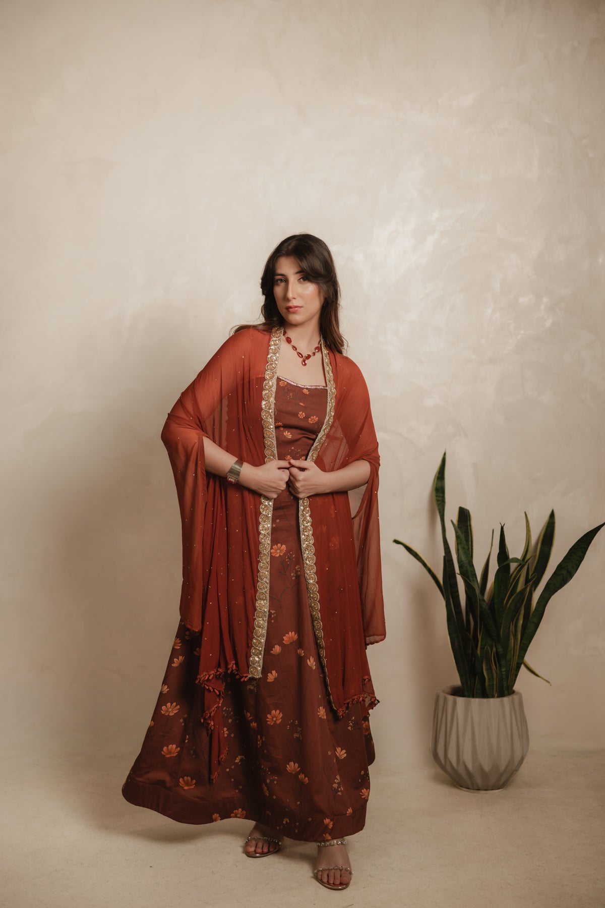 Sthira Calendula gown in vegan silk, rust-brown botanical print, full length, cape dupatta over shoulders