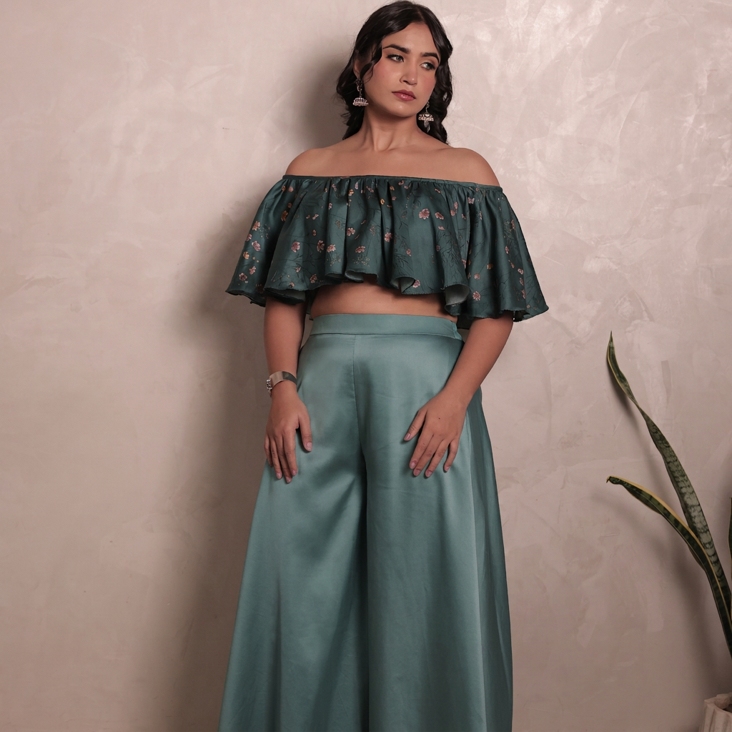 Sthira Bluebell co-ord set in vegan silk, deep teal ruffle blouse and smooth satin trousers, closer view